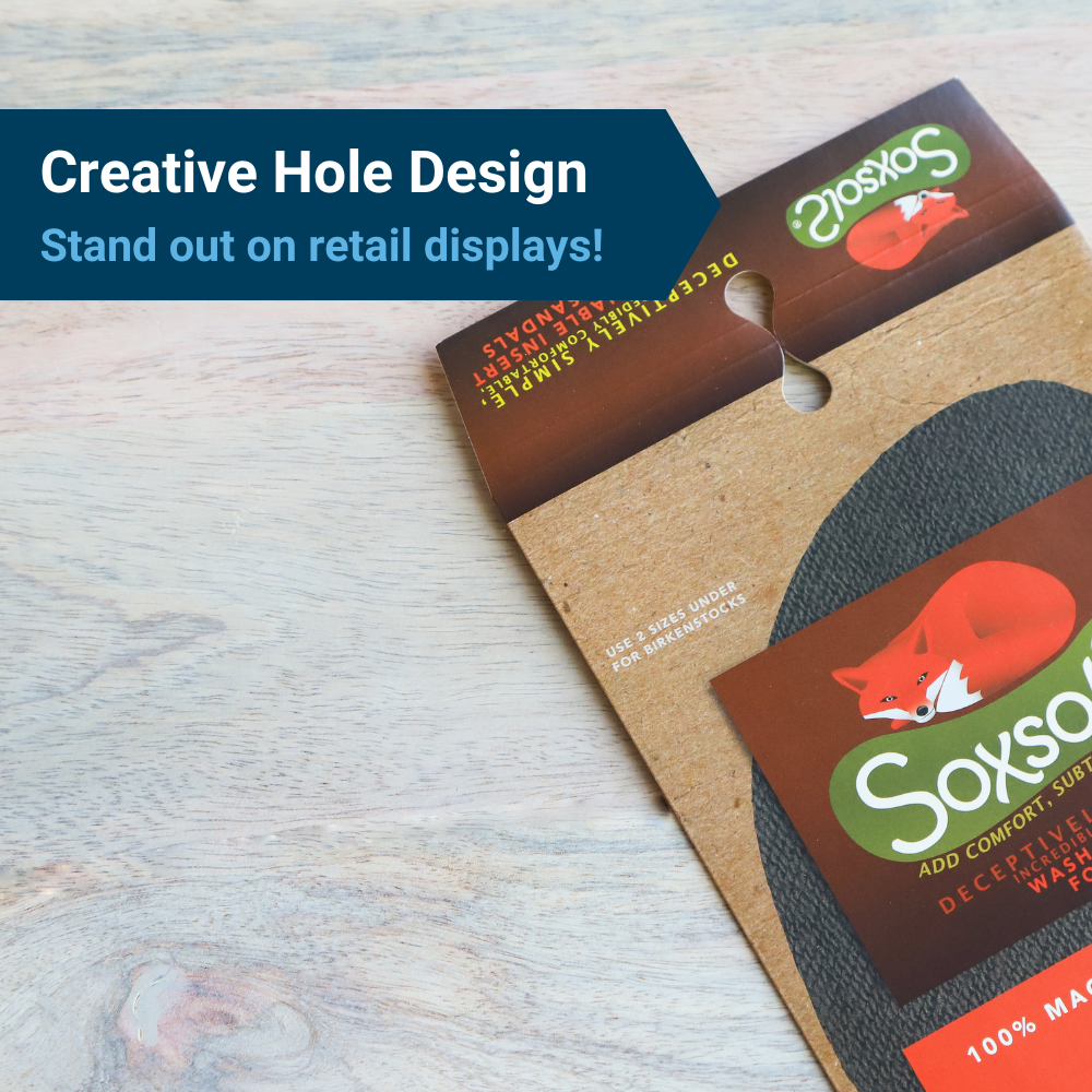 SoxsolS branded merchandise packaging, featuring  a unique teardrop hole for hanging, under the heading, "Creative hole design: Stand out on retail displays!"