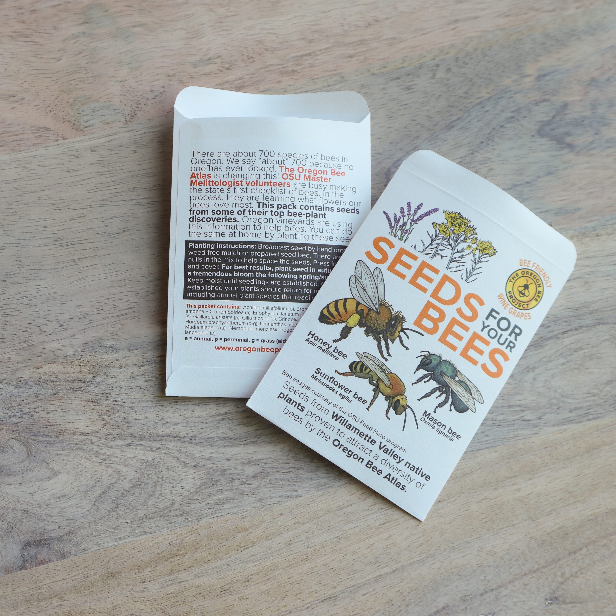 Oregon State University's seed packets, featuring botanical illustrations, planting instructions, and the heading, "Seeds for your bees."