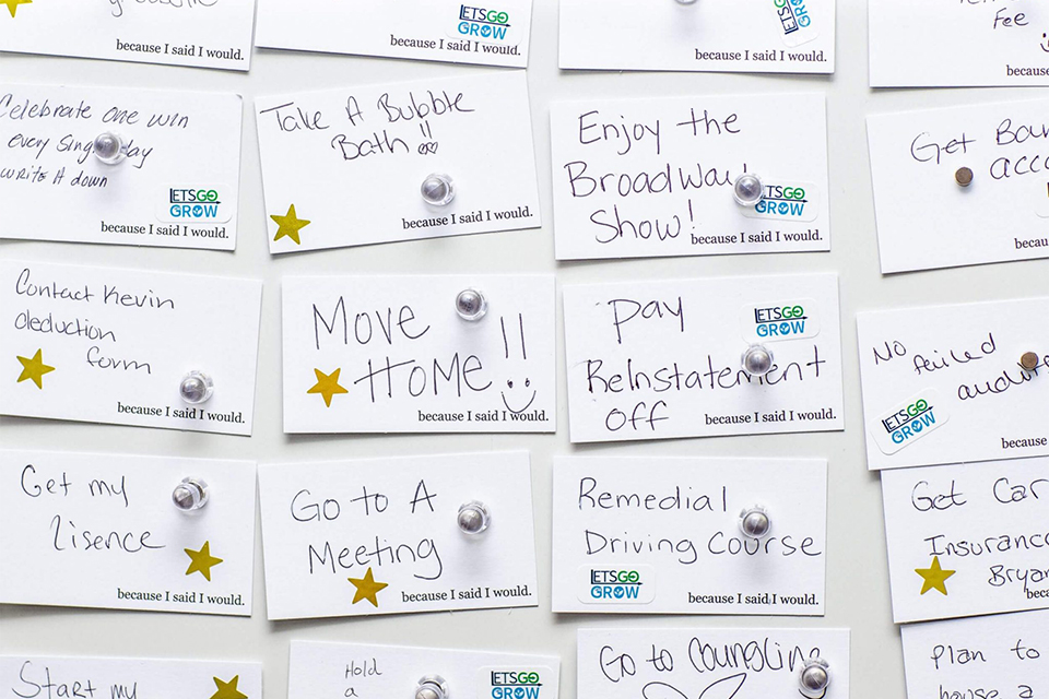 Notecards with goal statements written by employees as part of the second chance hiring program at JBM.