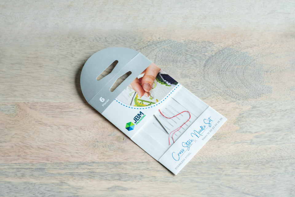 A sturdy paper envelope with a clear window to display the product inside.