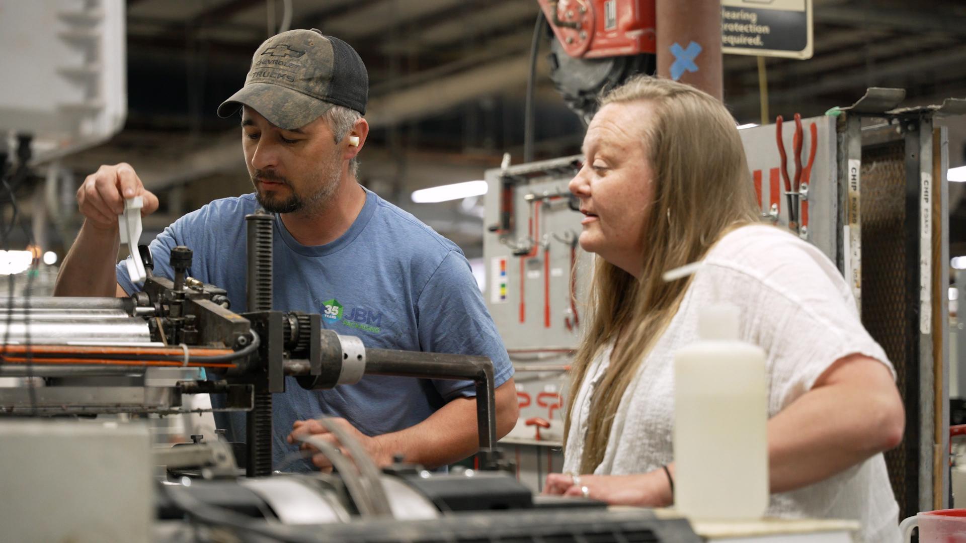 Production employees at work at the JBM Packaging company.